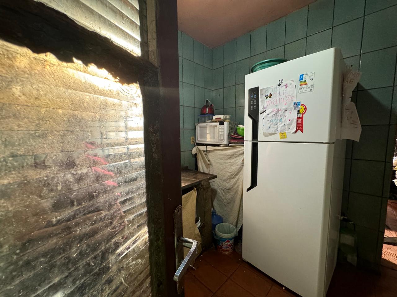 Terreno com casa antiga para reforma ou demolição em rua principal do Jd Novo II