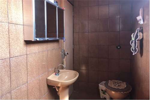 Sobrado quatro quartos, mais três casinhas para investimento