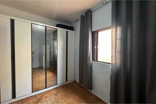 Casa com Três Dormitórios